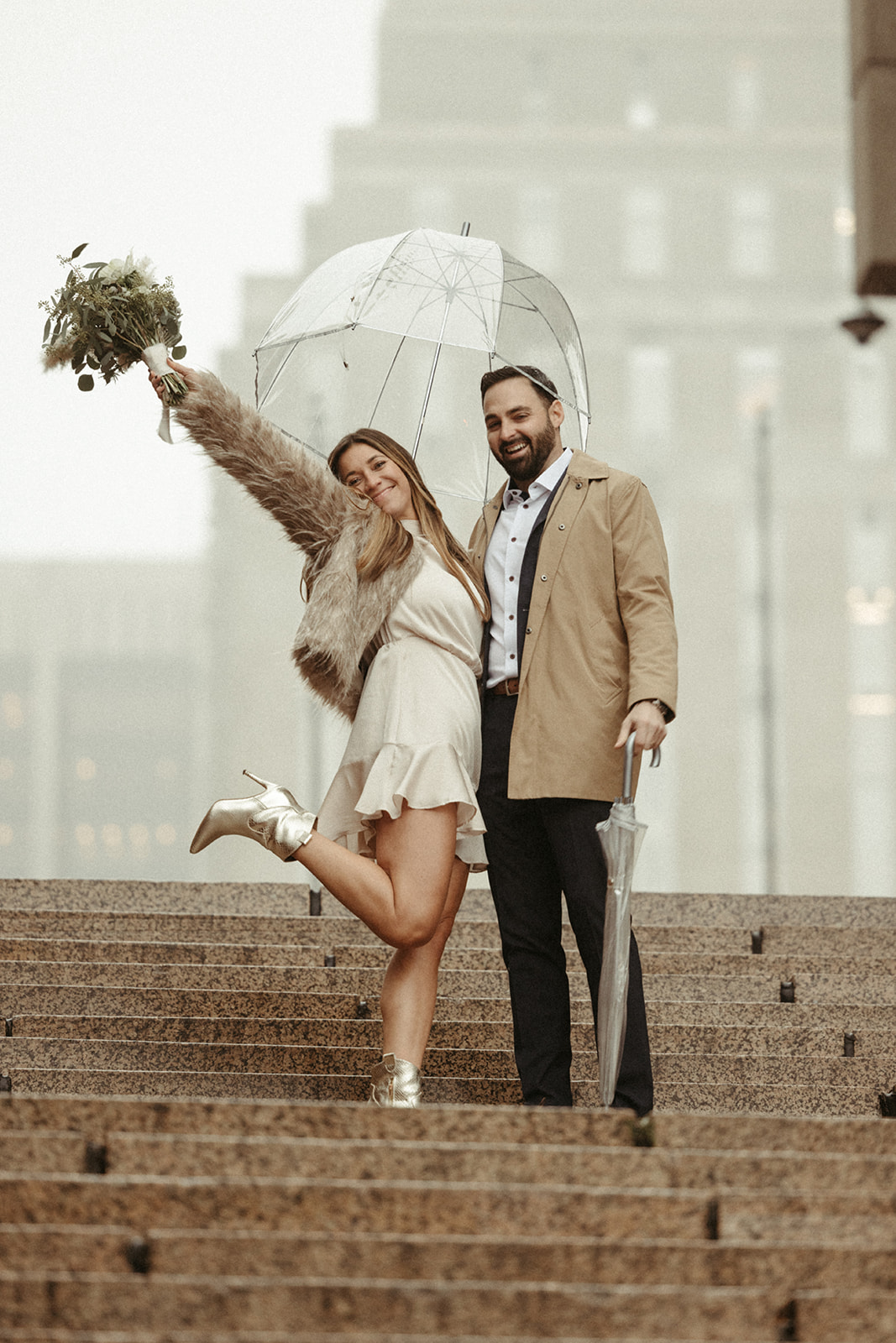 Couple eloping in Boston in the rain, a Boston elopement idea from a real wedding day